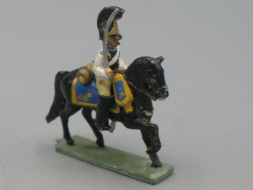 Soldat de plomb - Cavalier de l'empire, cheval noir, selle bleu