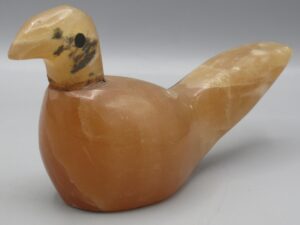 Statuette oiseau en pierre orangée