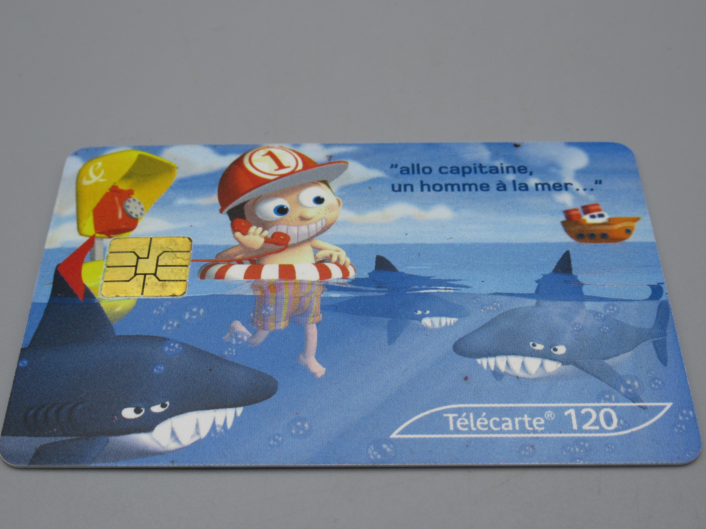 Télécarte 120 - Allo capitaine, un homme à la mer...