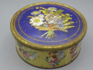 Boîte métal ronde motif bouquets de fleurs