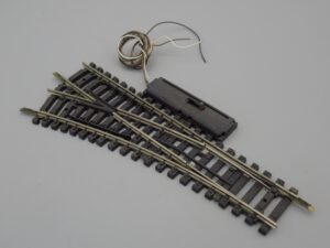 Rail aiguillage électrique à gauche R385 mailchort - Jouef