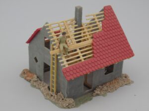 Maison en construction avec personnage - Faller 130246