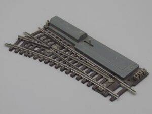 Rail aiguillage électrique à gauche 14.5 cm gris - HOrnby