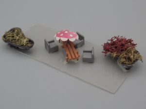 Zone de repos avec table et fauteuils - Echelle H0