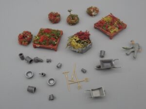 Jardinier avec ses accessoires et plantations - H0