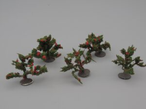 5 arbustes aux fleurs rouges hauteur 3 à 3.5 cm