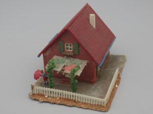 Maison de village avec femme au parapluie - Faller B-244