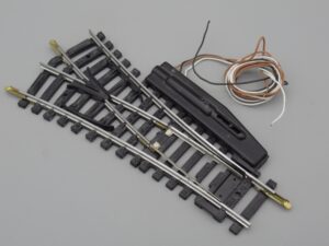 Rail aiguillage élec. symétrique R=504 28° - Jouef