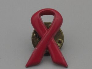 Pin's Sidaction rouge