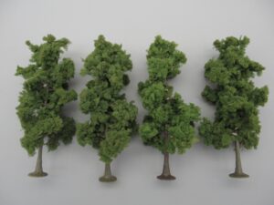 4 arbres sur pied 11 cm