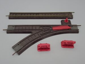 1 rail, 2 heurtoirs et 1 aiguillage à gauche 24.7 cm - Jouef