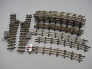 Système 3 rails - 19 rails et aiguillages P.M.P. et P. Tourelle