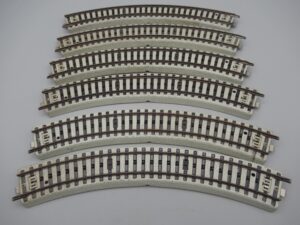 Système 3 rails Voie M, 6 rails courbes R=280 45° - Märklin 5089