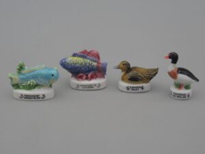 4 fèves des séries Poissons et Canards - Editions Atlas